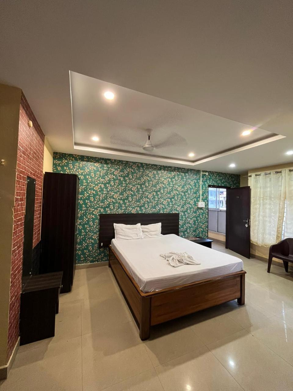 فندق H K Residency Near Kalakshetra غاواهاتي المظهر الخارجي الصورة